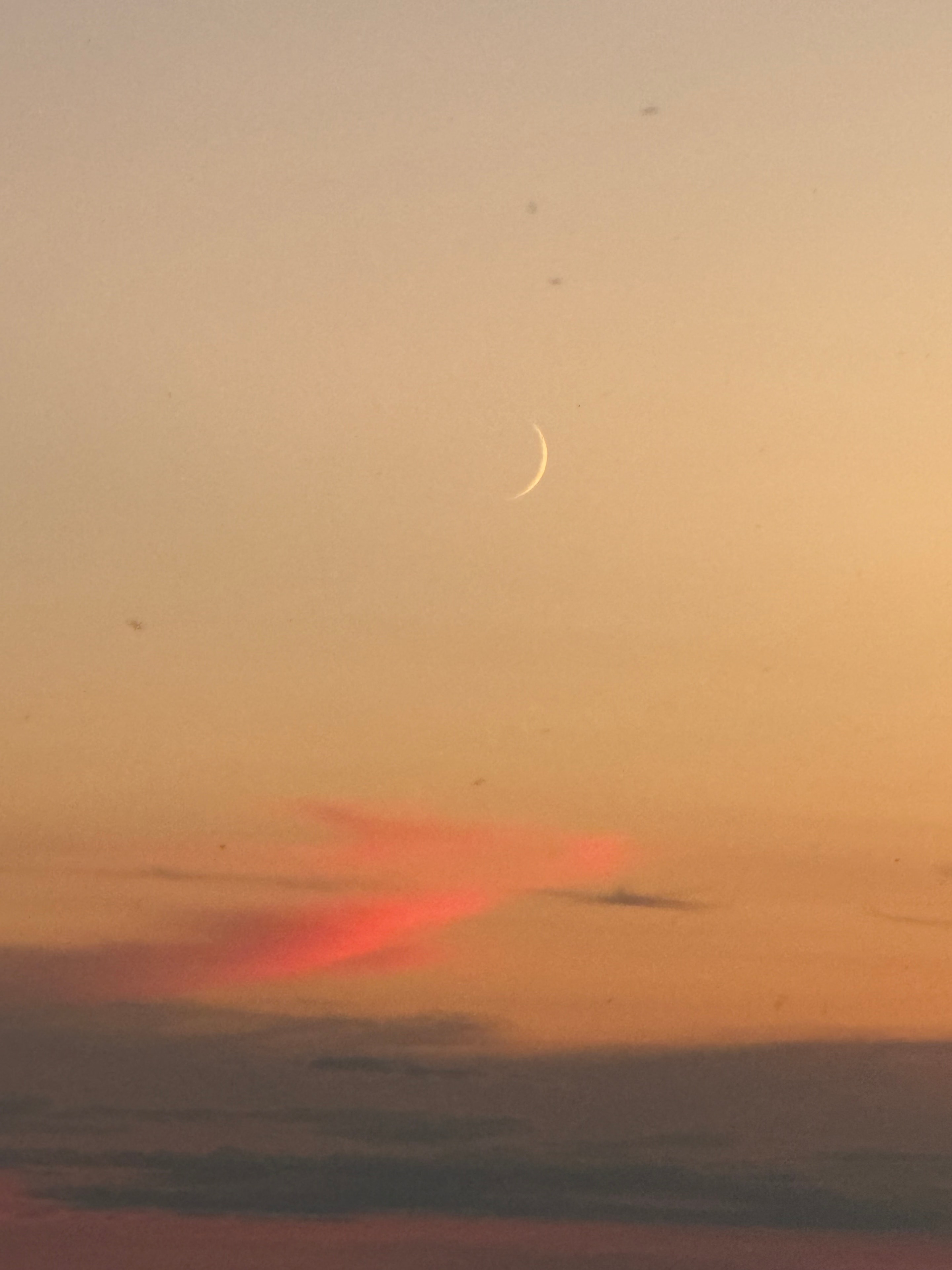 Crescent Moon Rising in the Sunset Haze