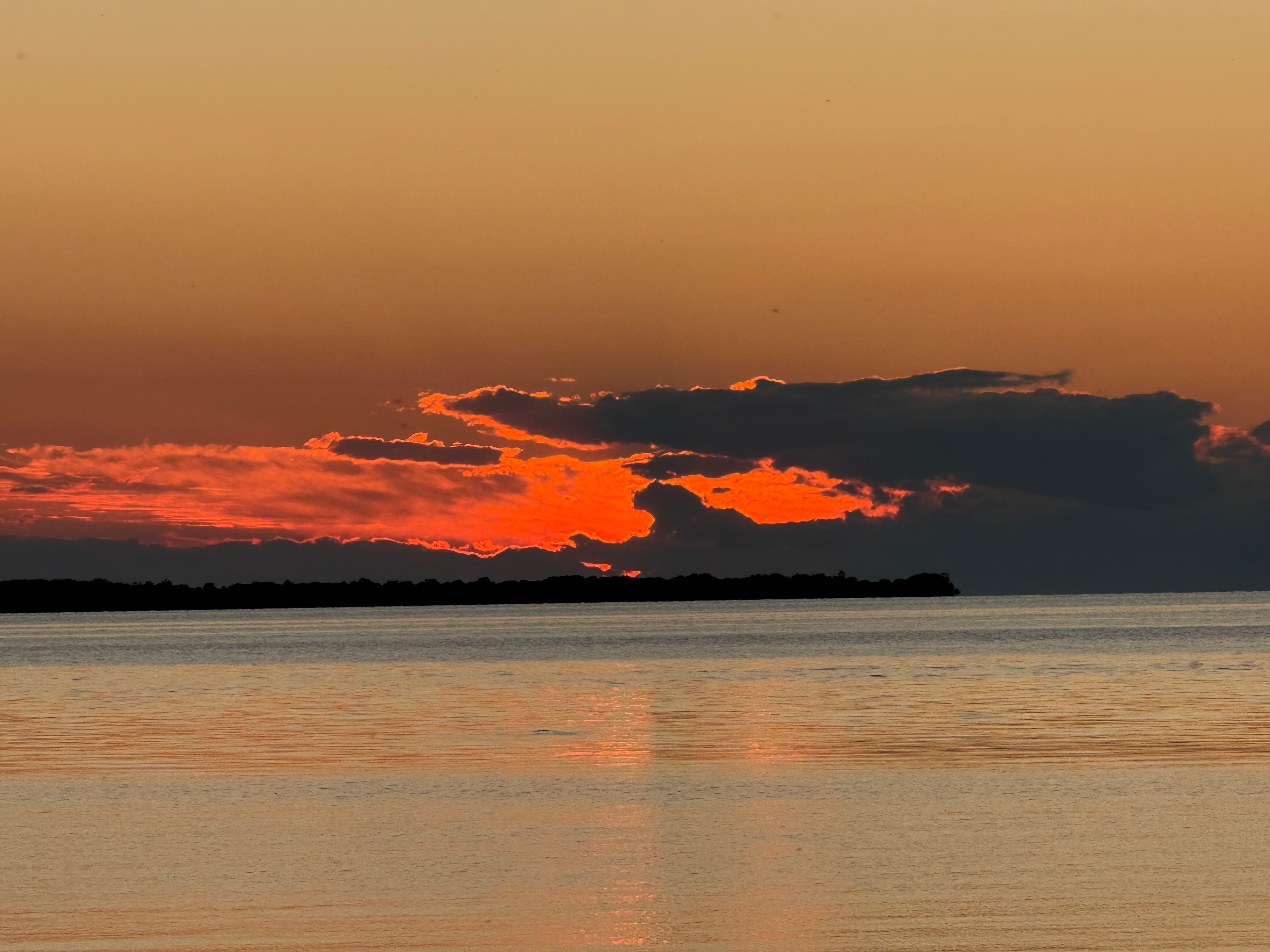 Glowing Sunset Clouds on the Water