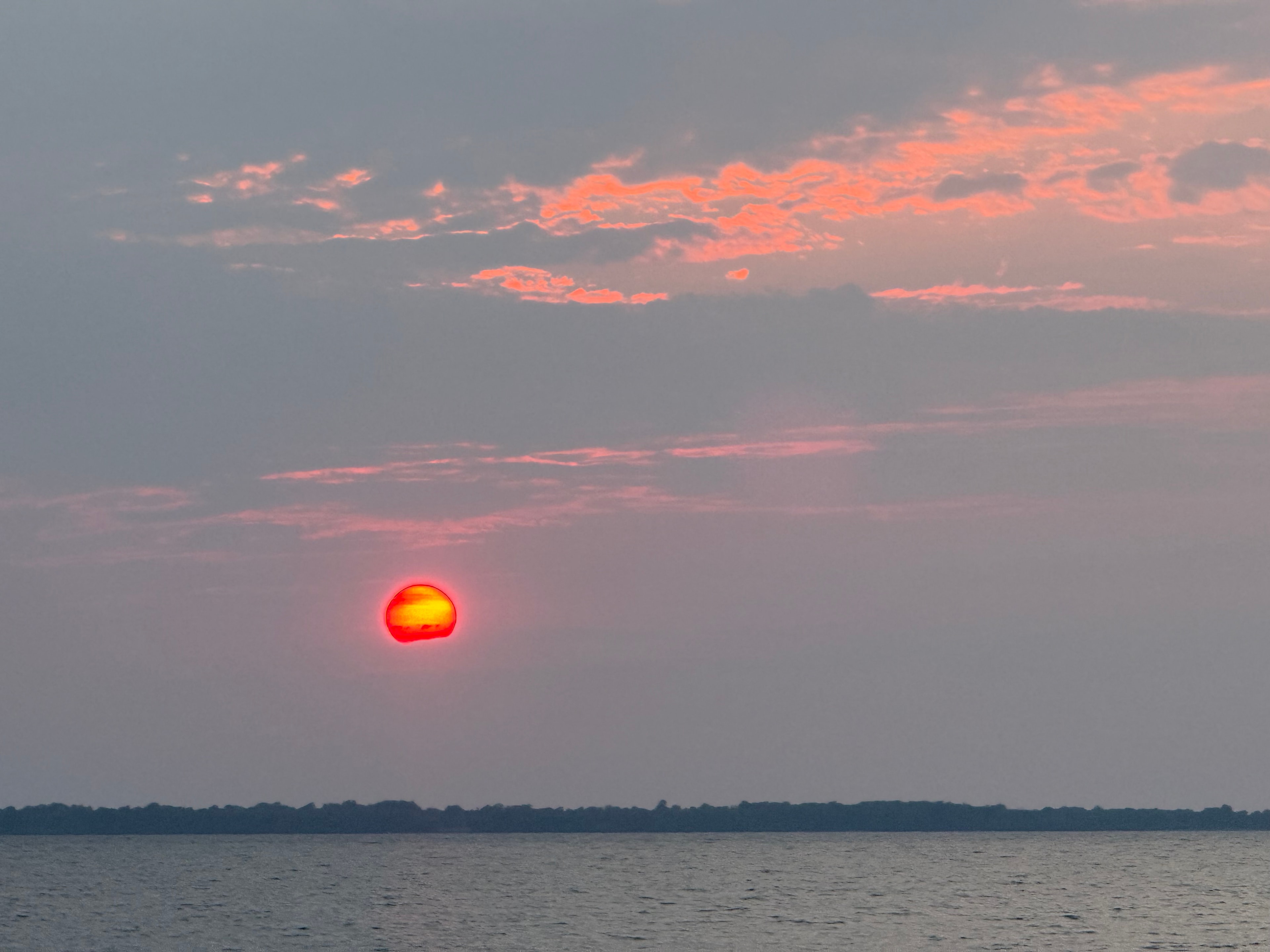 Red Sun Setting on the Lake