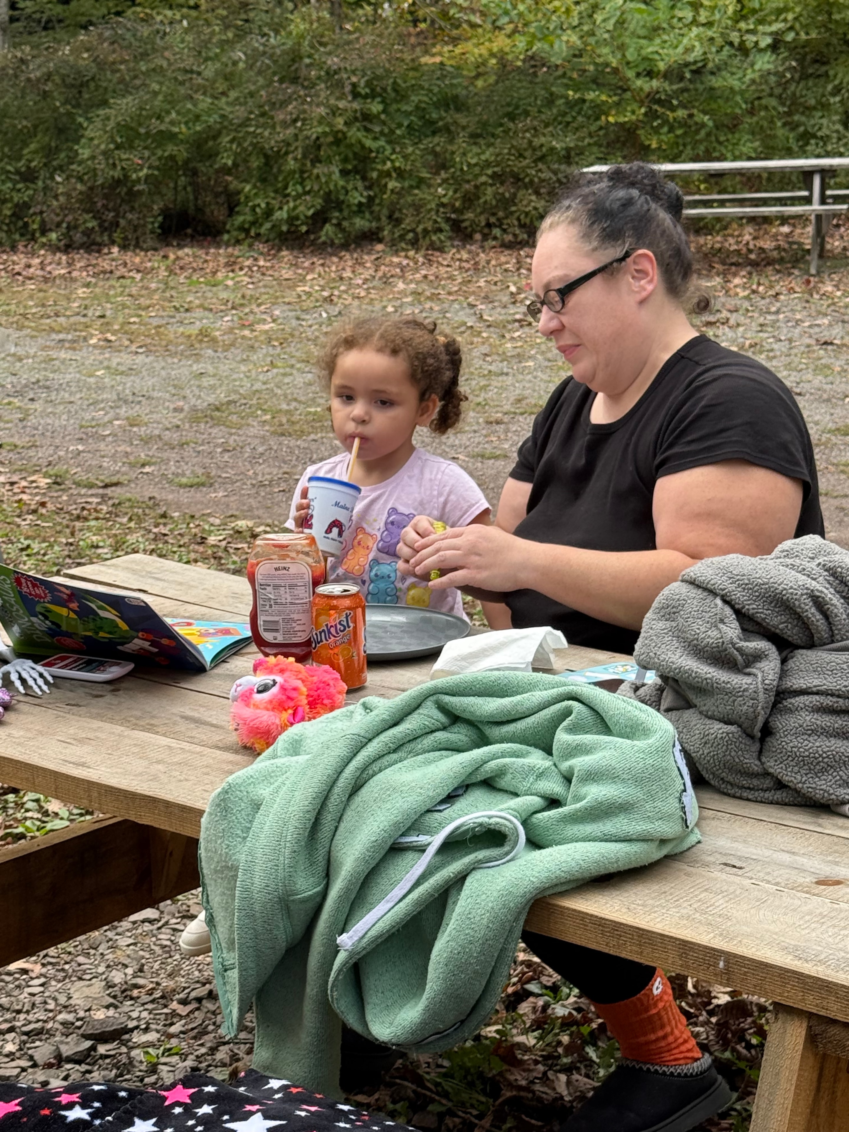 Reading at the picnic table