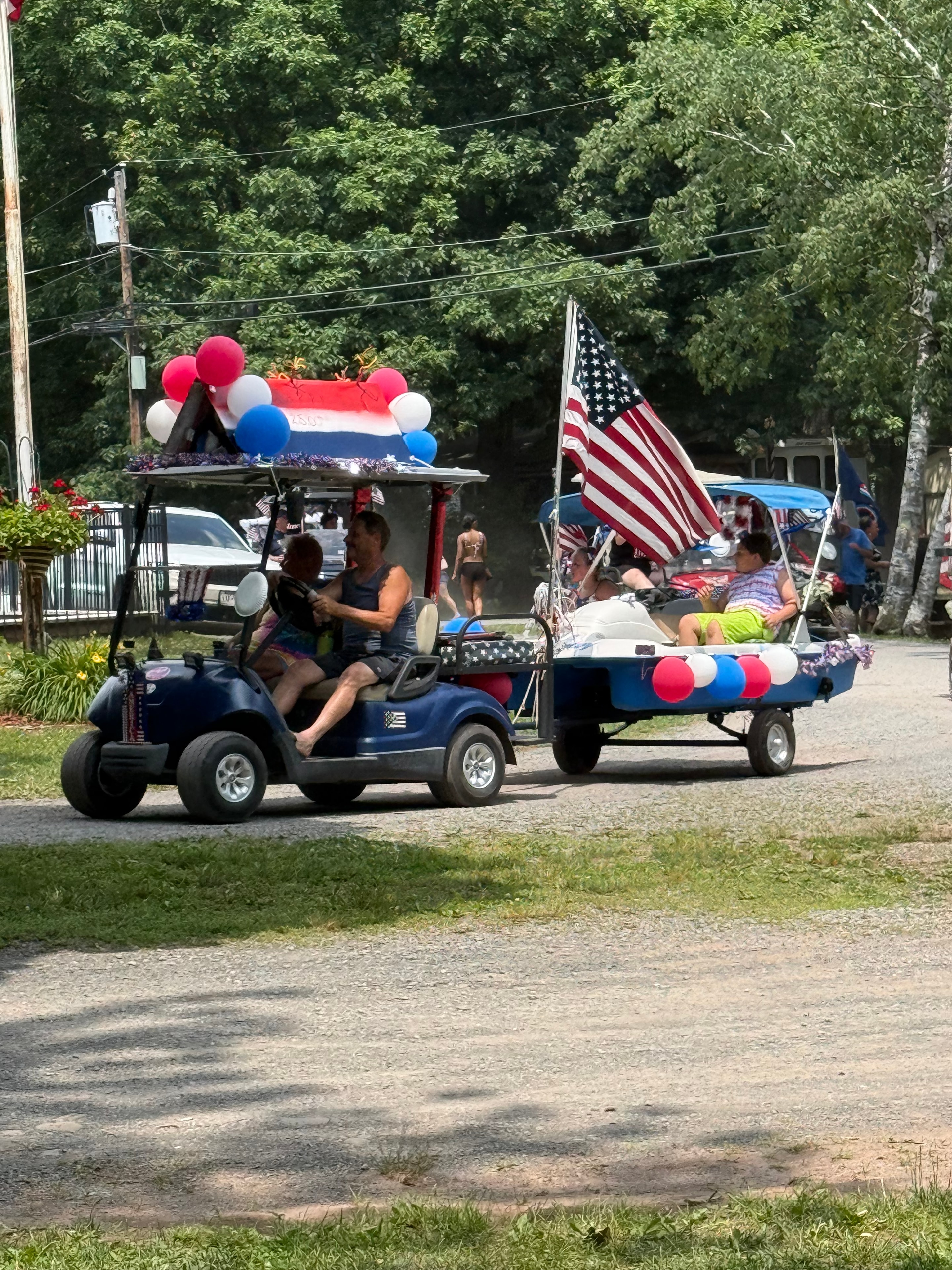 Blue cart with American flag and balloons
