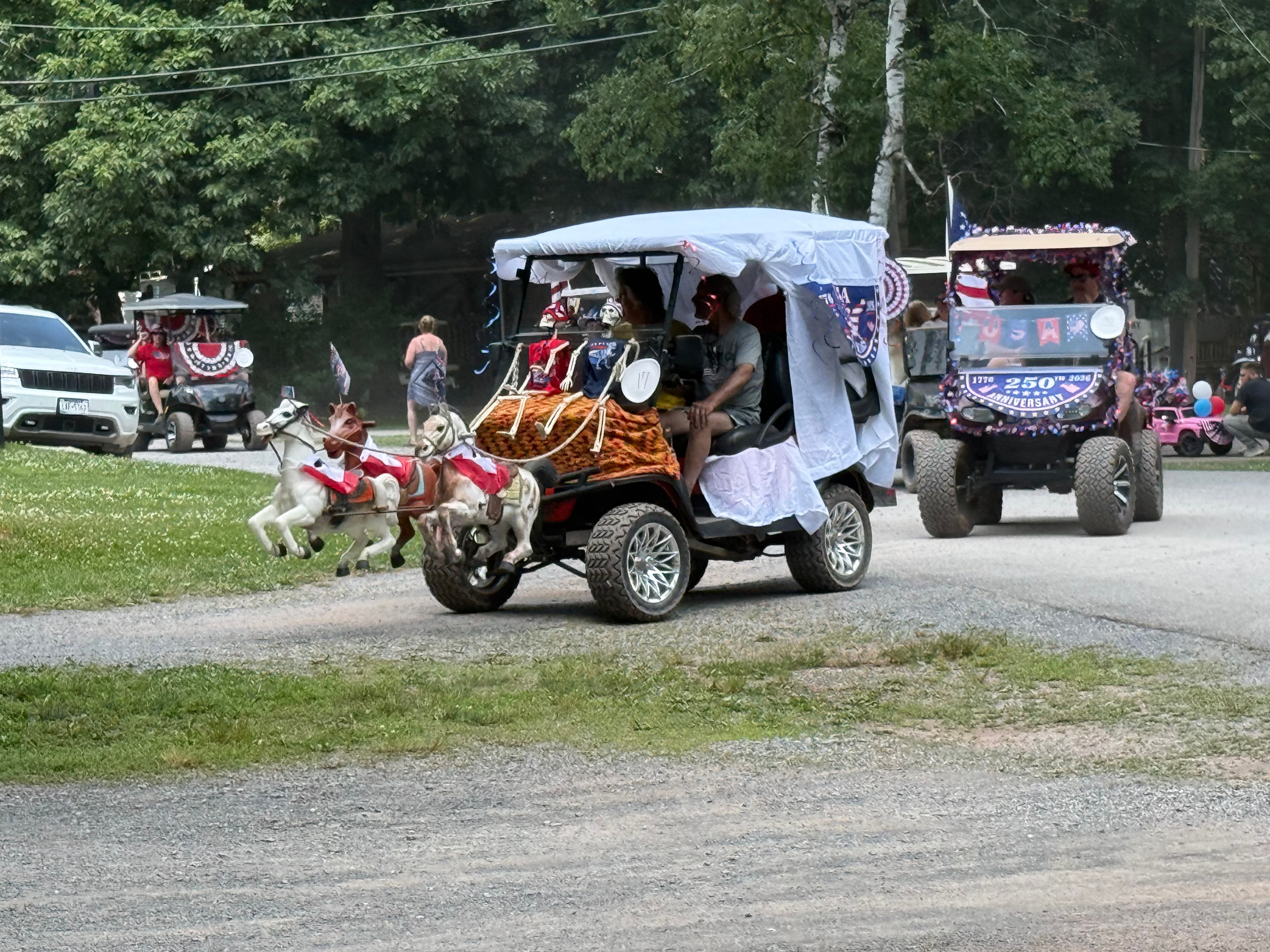 Golf cart dressed as a horse-drawn chariot — America 250th