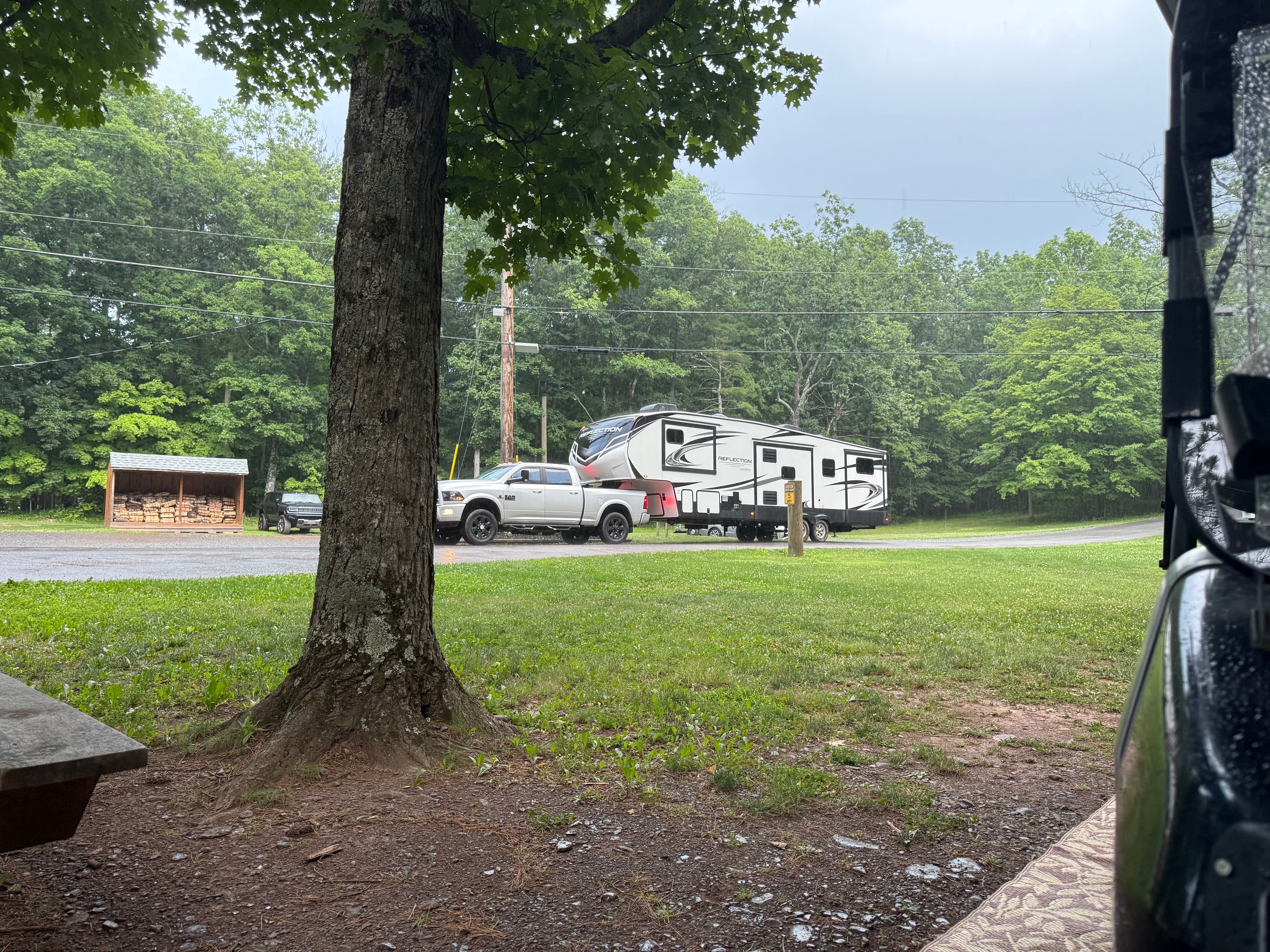 Ram truck & Reflection fifth wheel, rainy day
