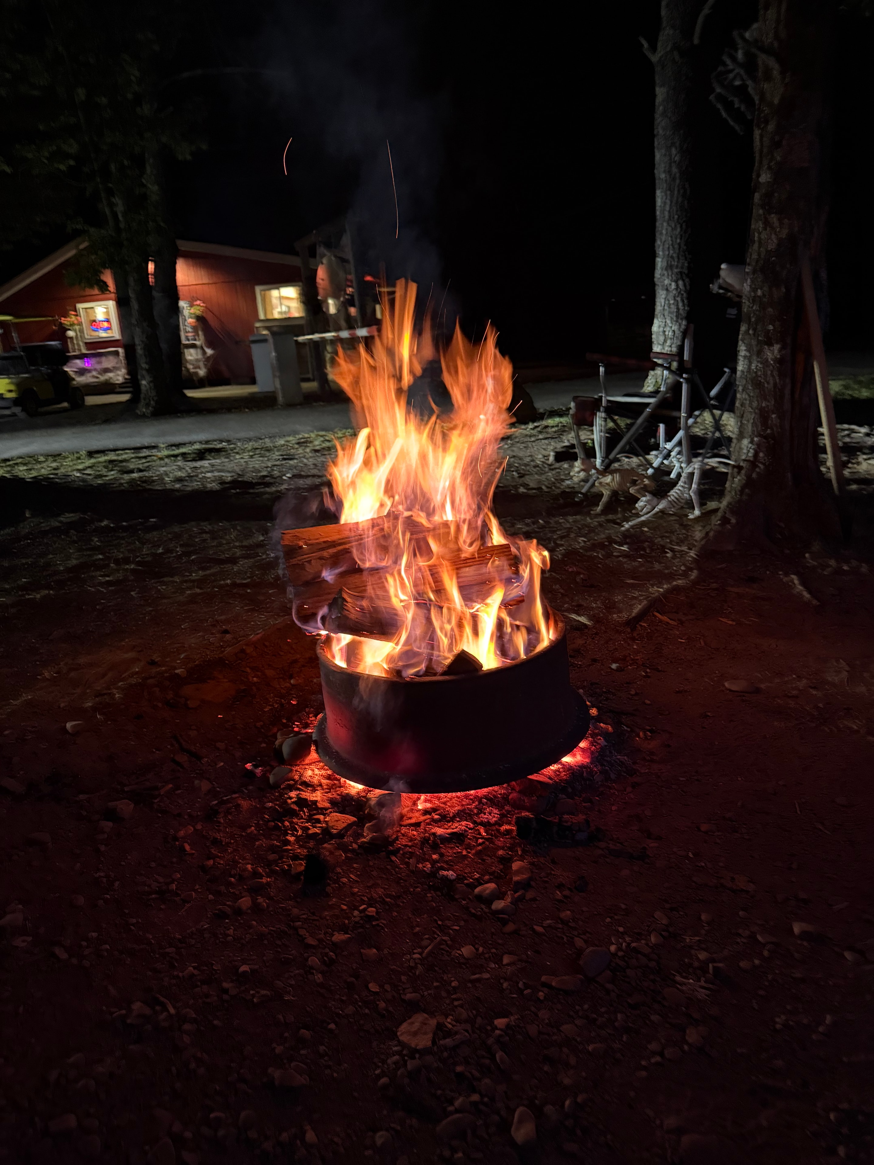 Blazing fire pit on Halloween night