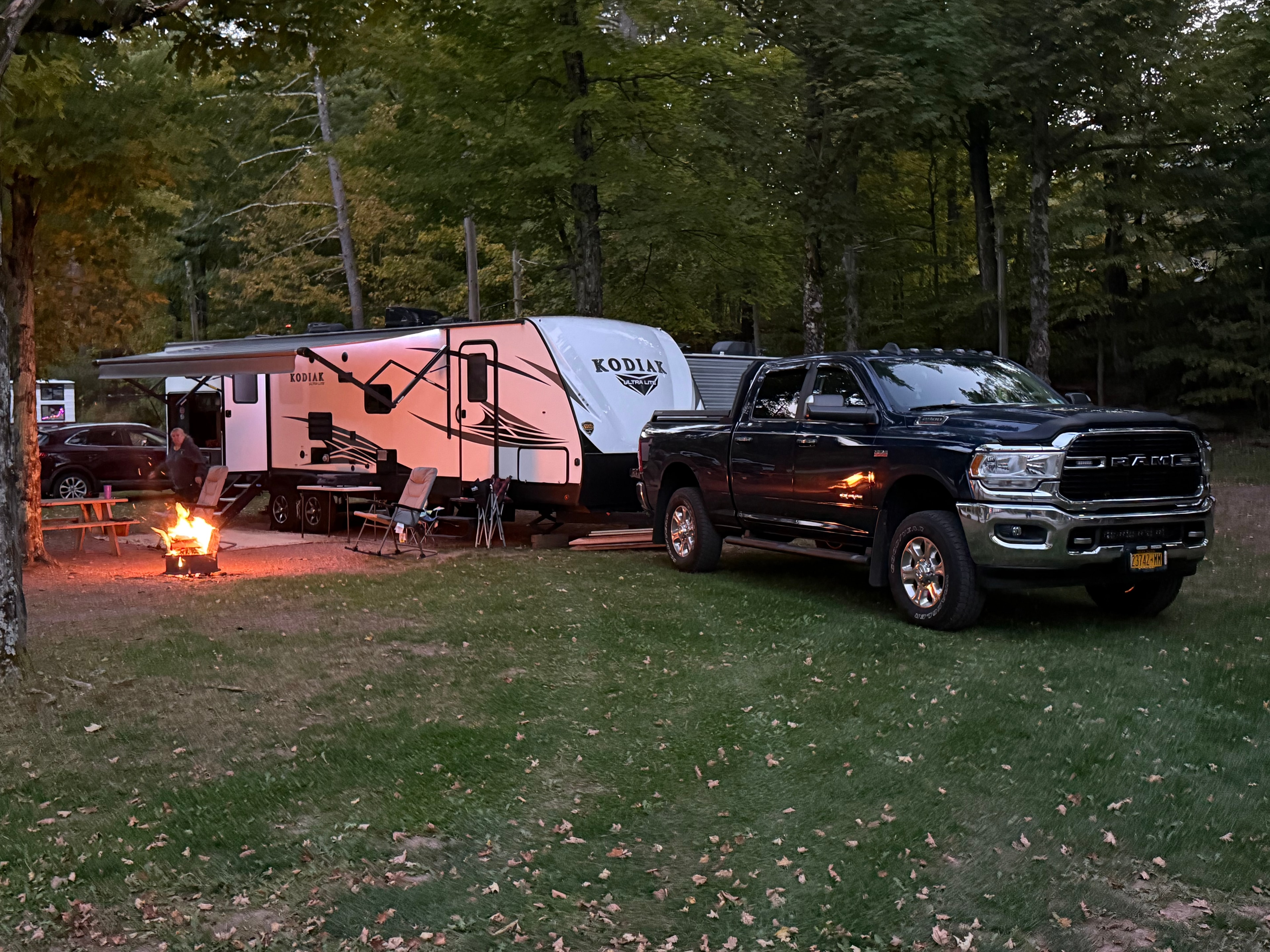 Kodiak and Ram at dusk with the fire going