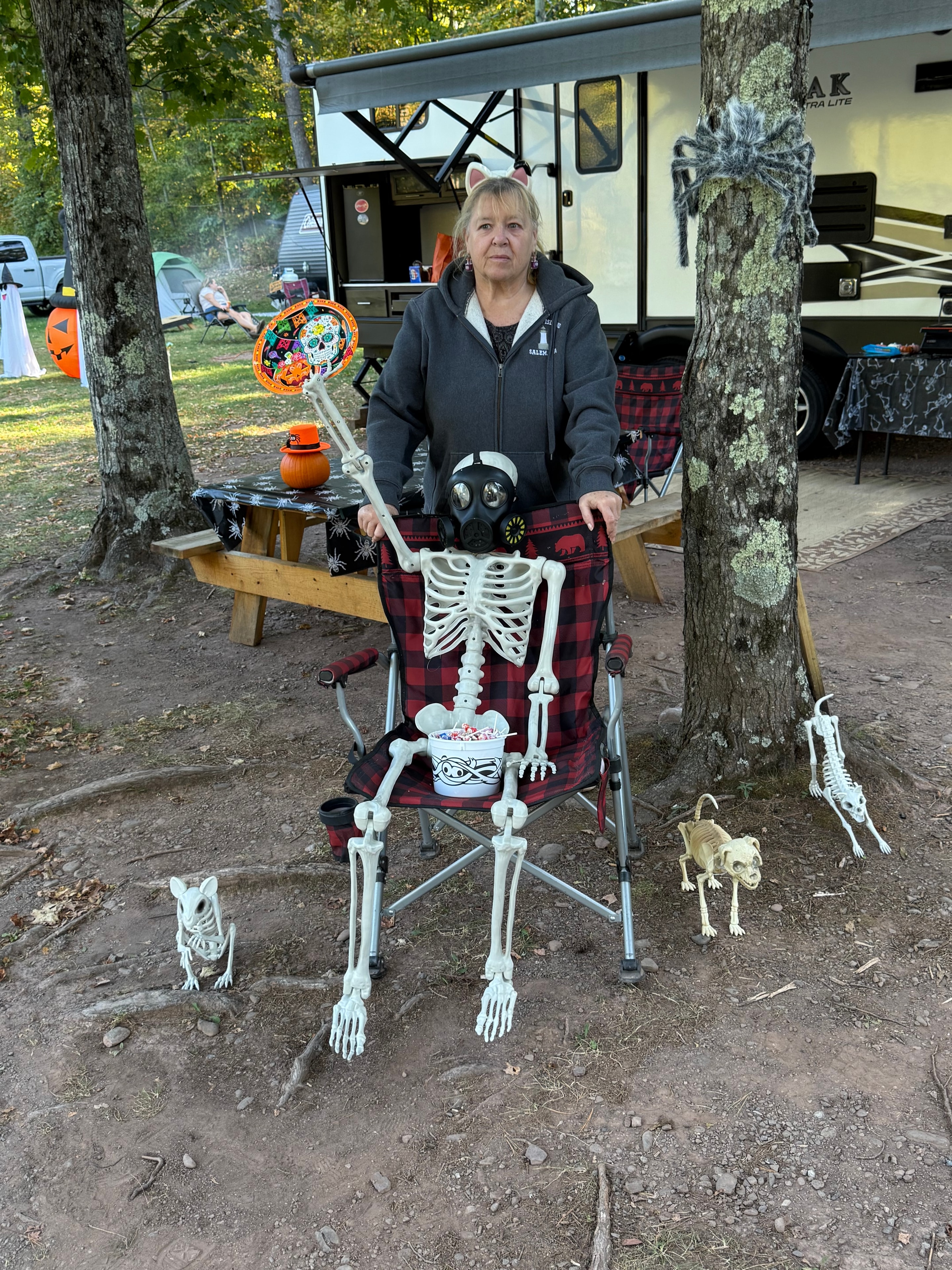 Posing with the skeleton candy holder