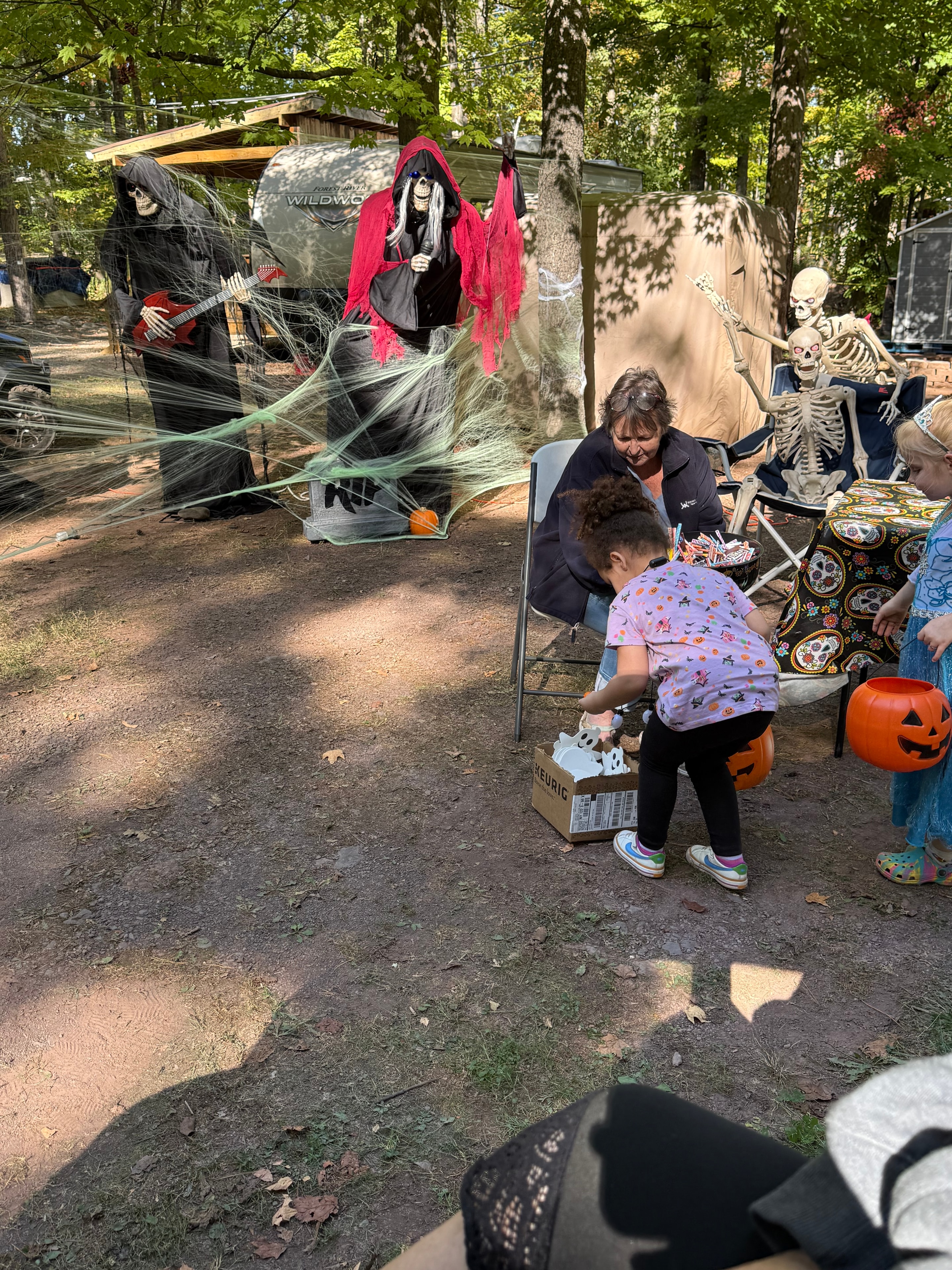 Handing out candy at the campsite