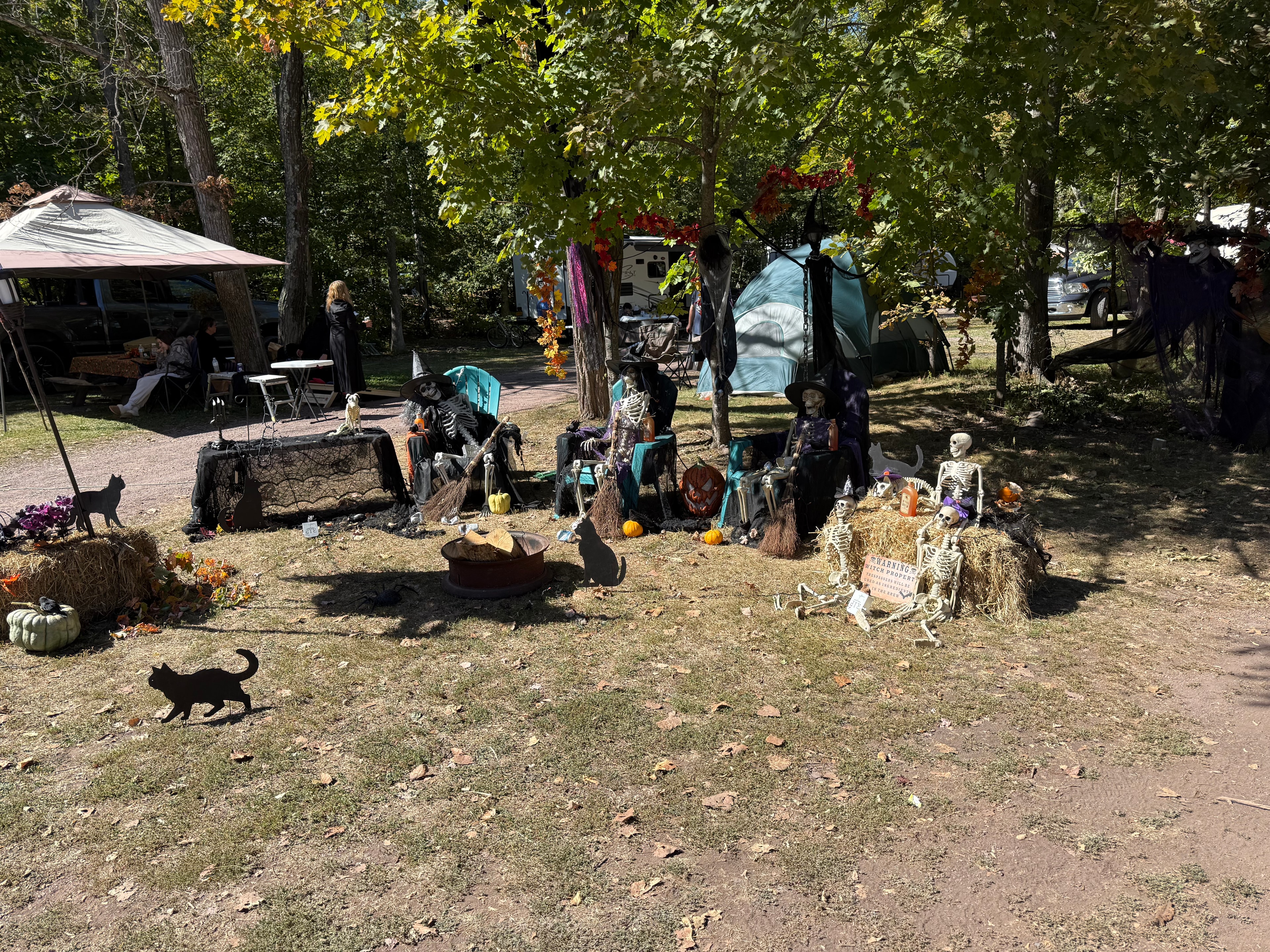 Witch and skeleton campsite display