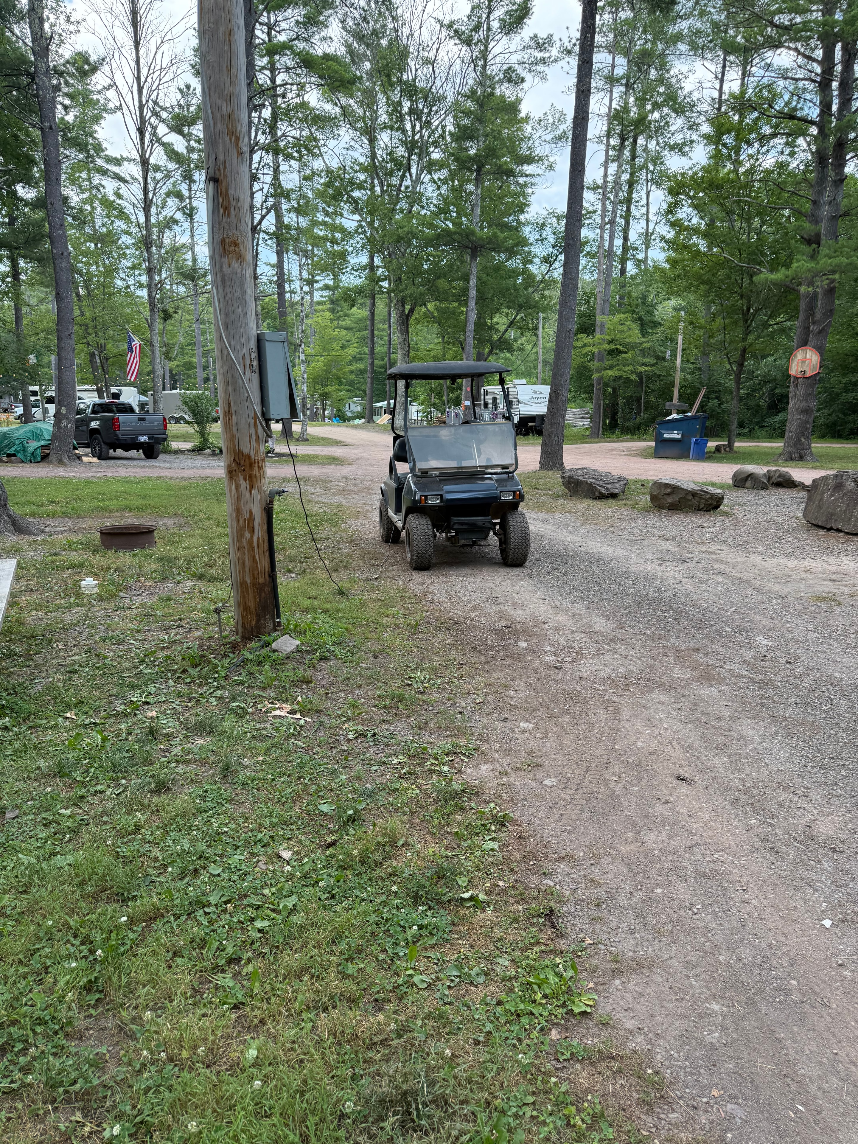 Golf cart on the campground road
