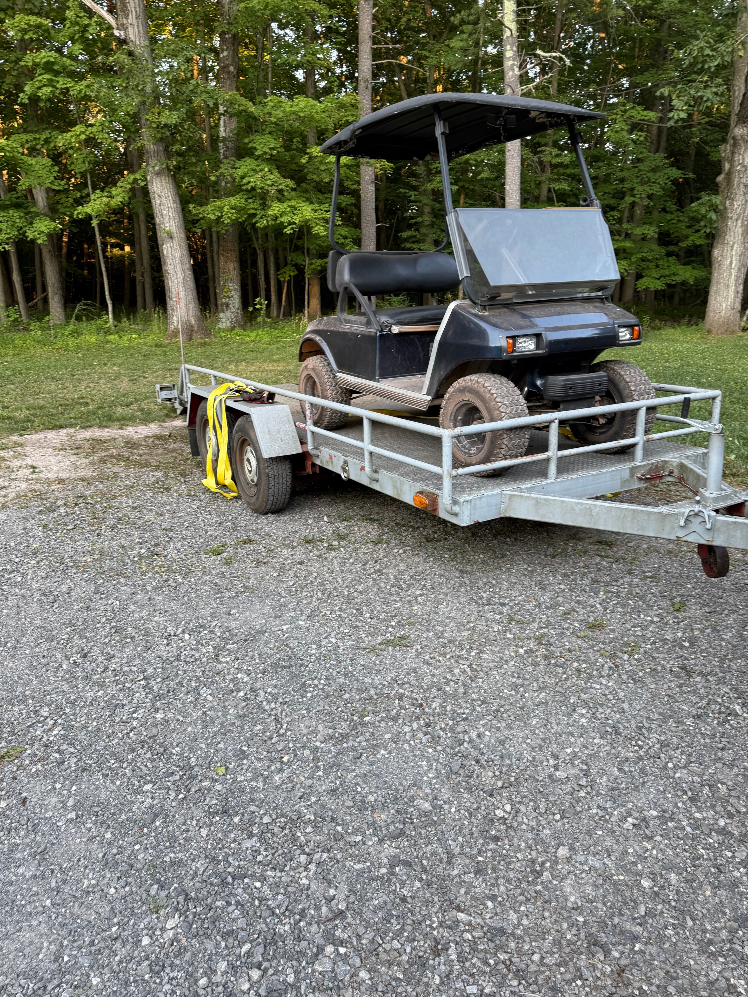 Golf cart and trailer ready to go