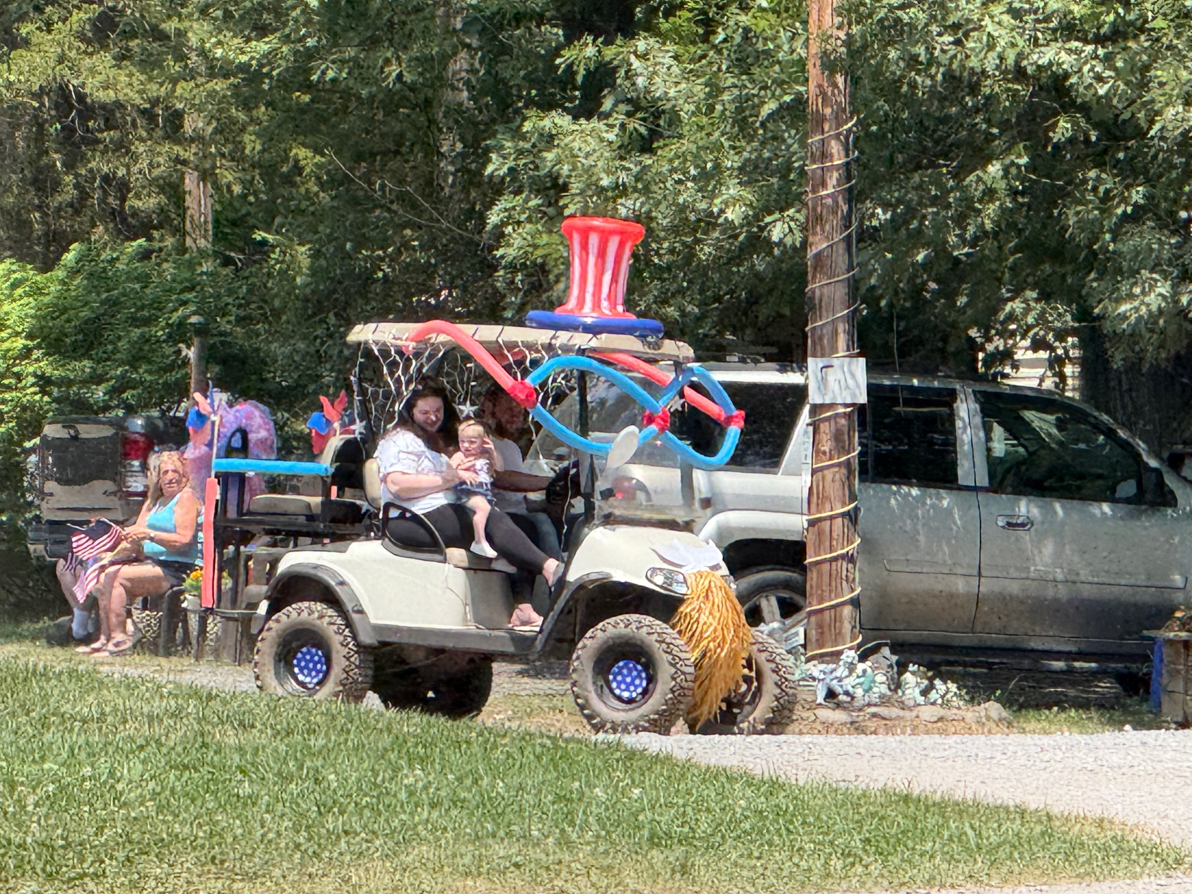 Golf cart with inflatable Uncle Sam hat