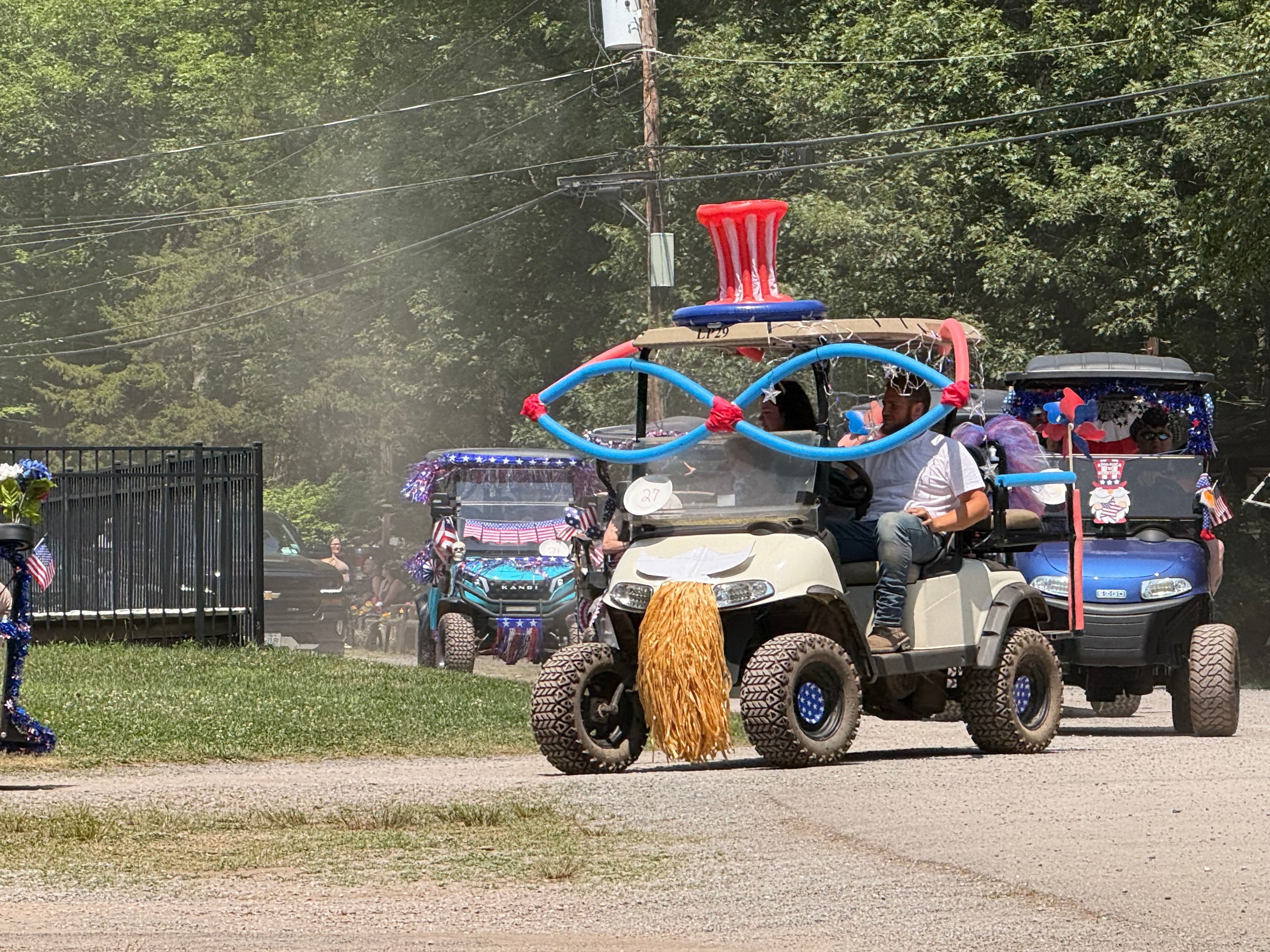 Golf cart decorated with pool noodles