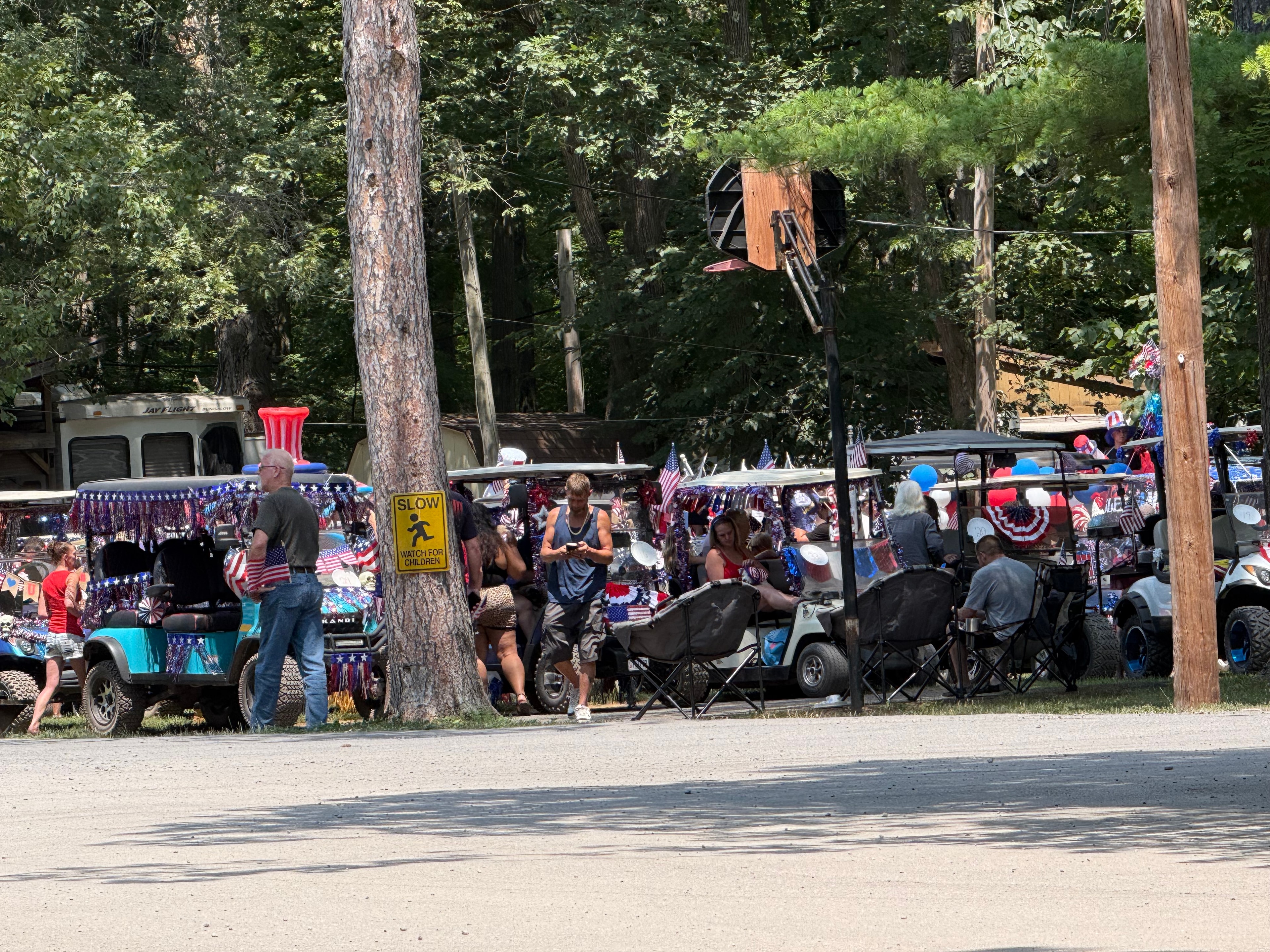 Golf carts lined up before the parade