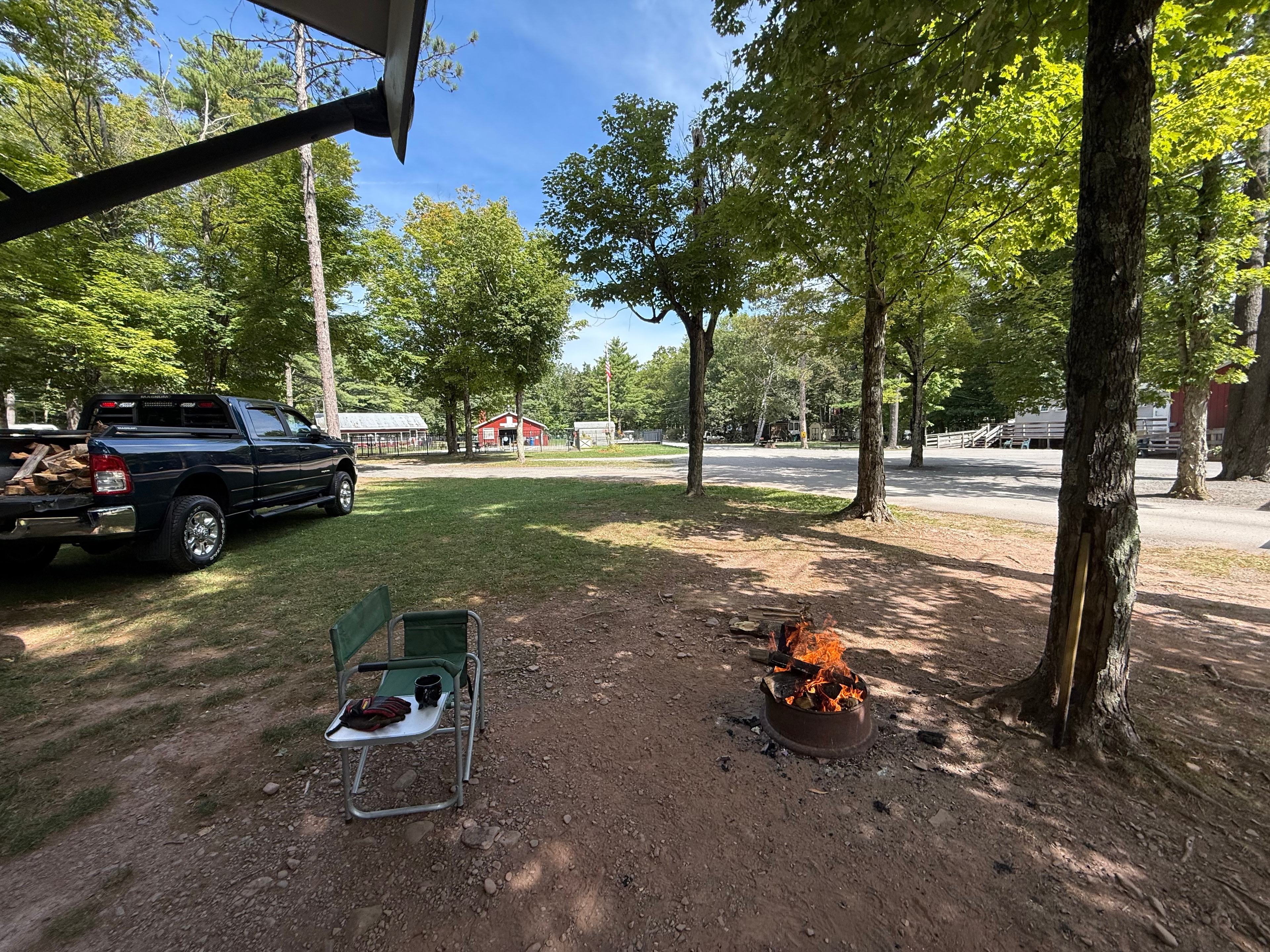 Campfire going with the Ram parked nearby