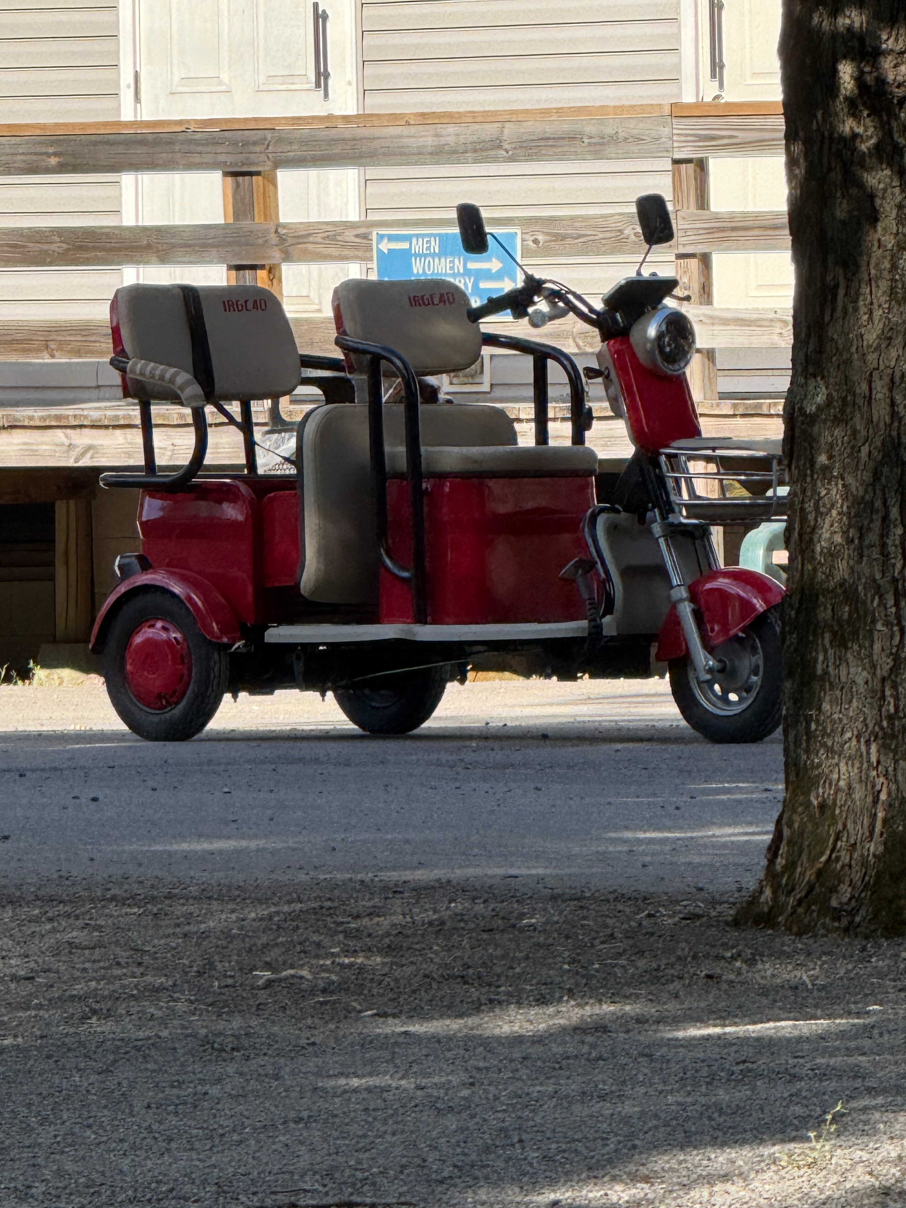 Red golf cart at the campground