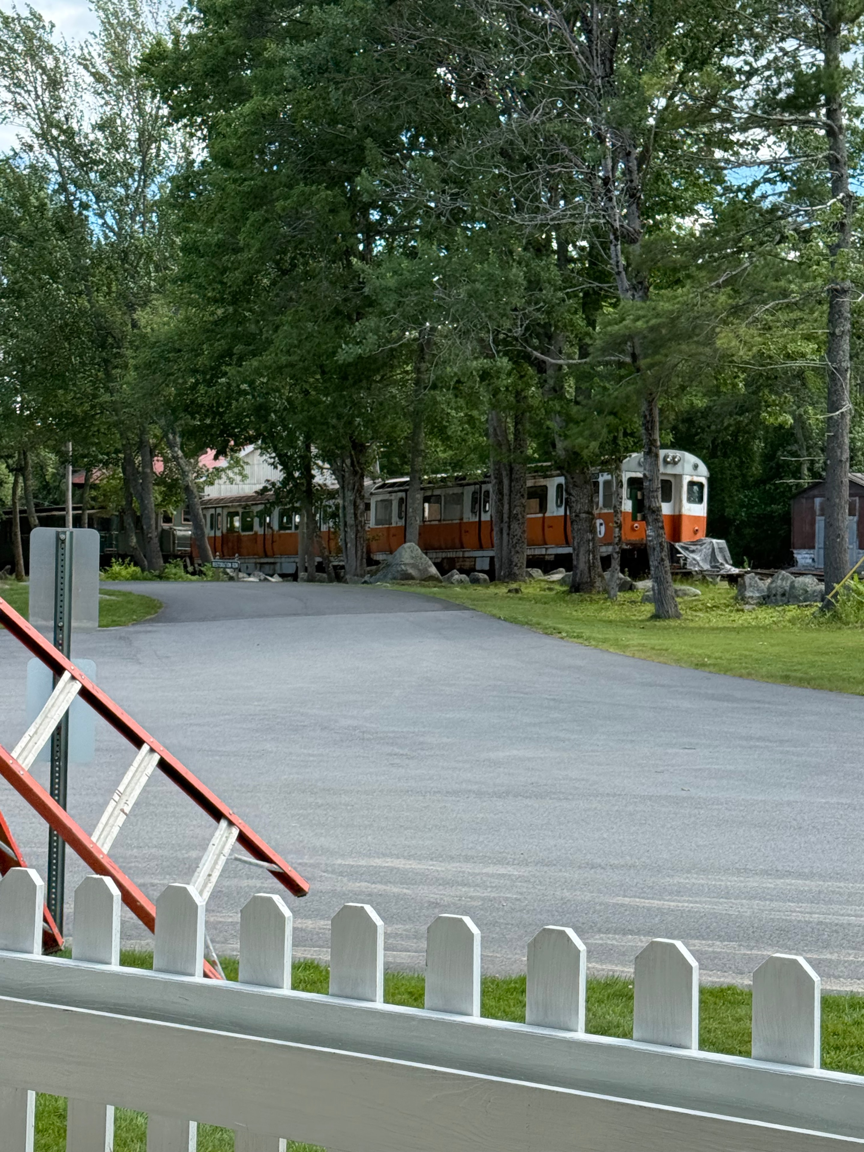Row of orange trolley cars