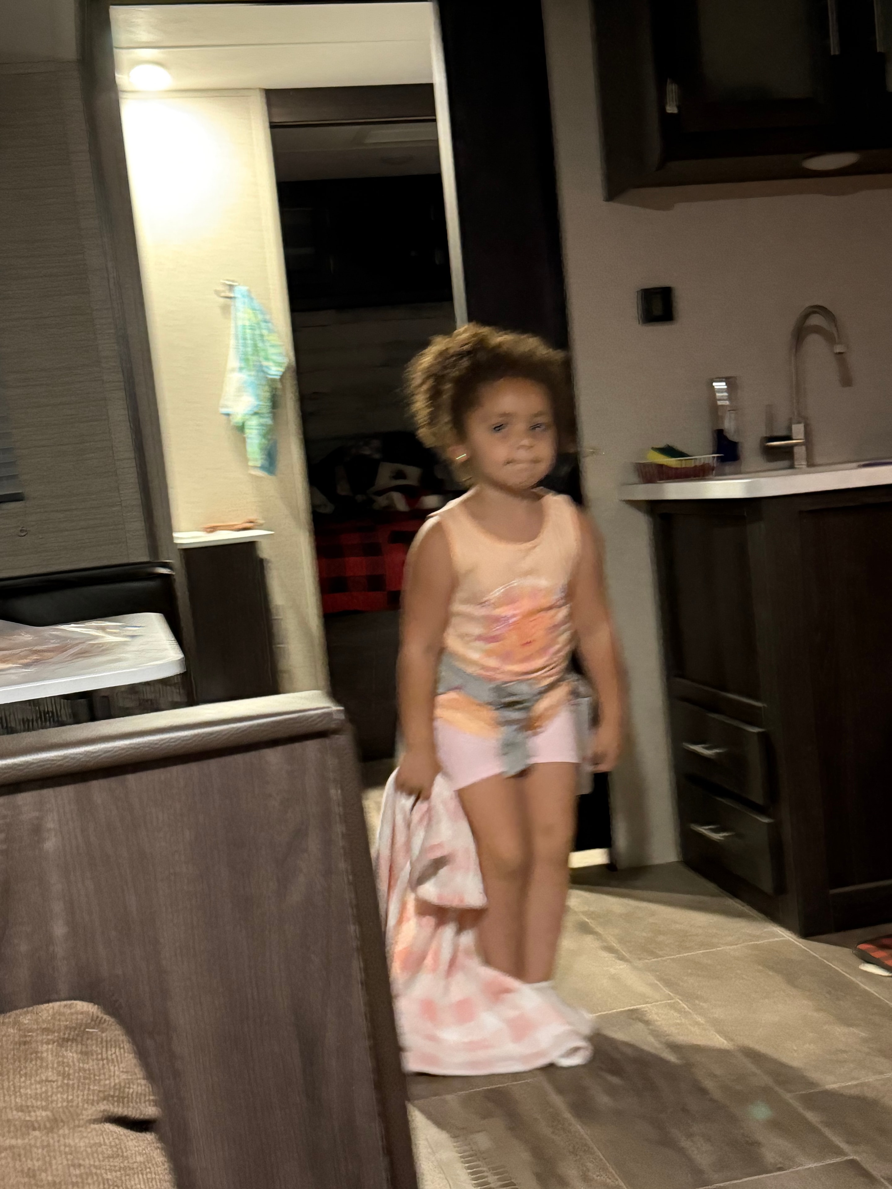 Smiling inside the RV at night