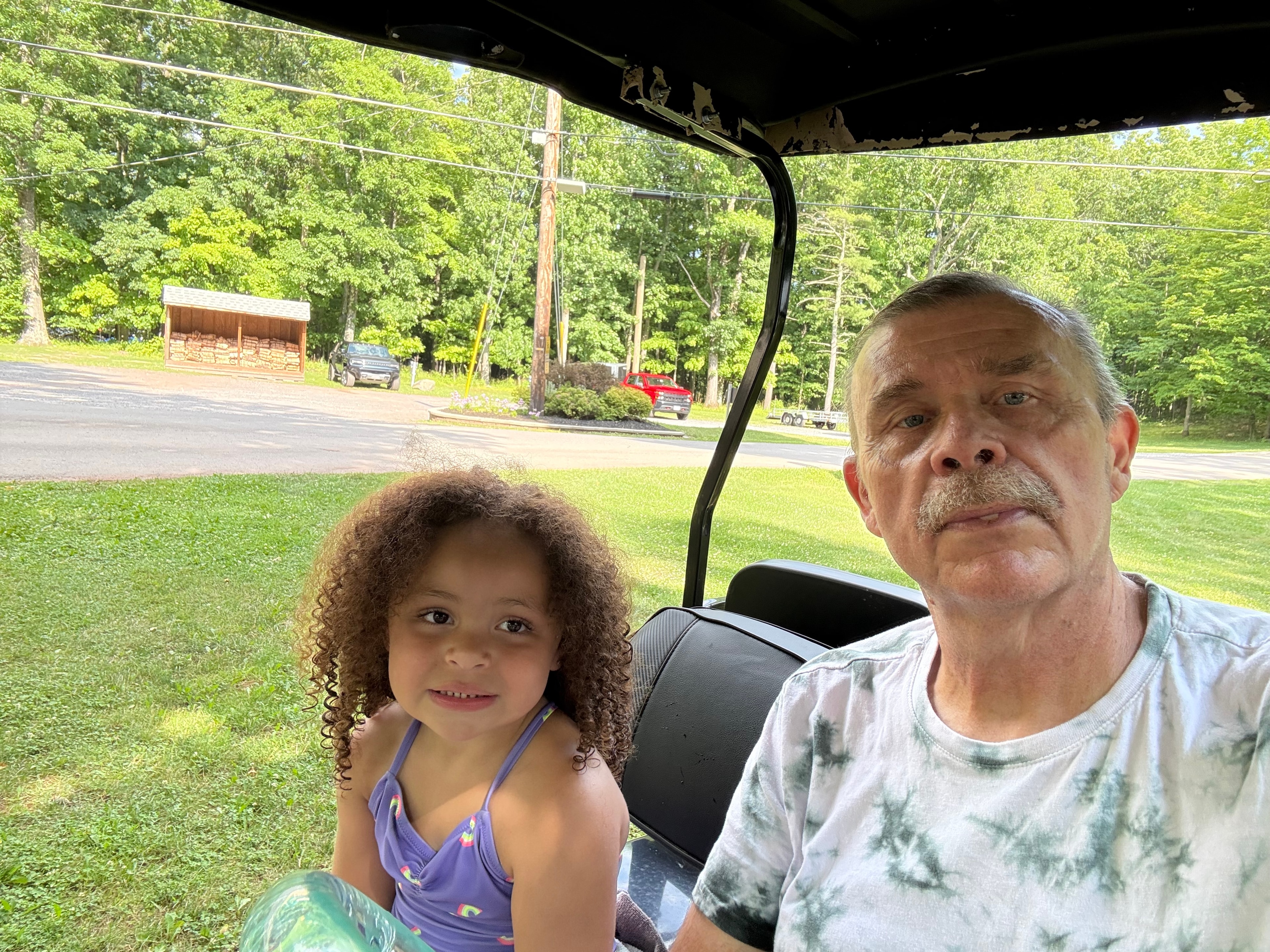 Golf cart ride around the campground with Grandpa