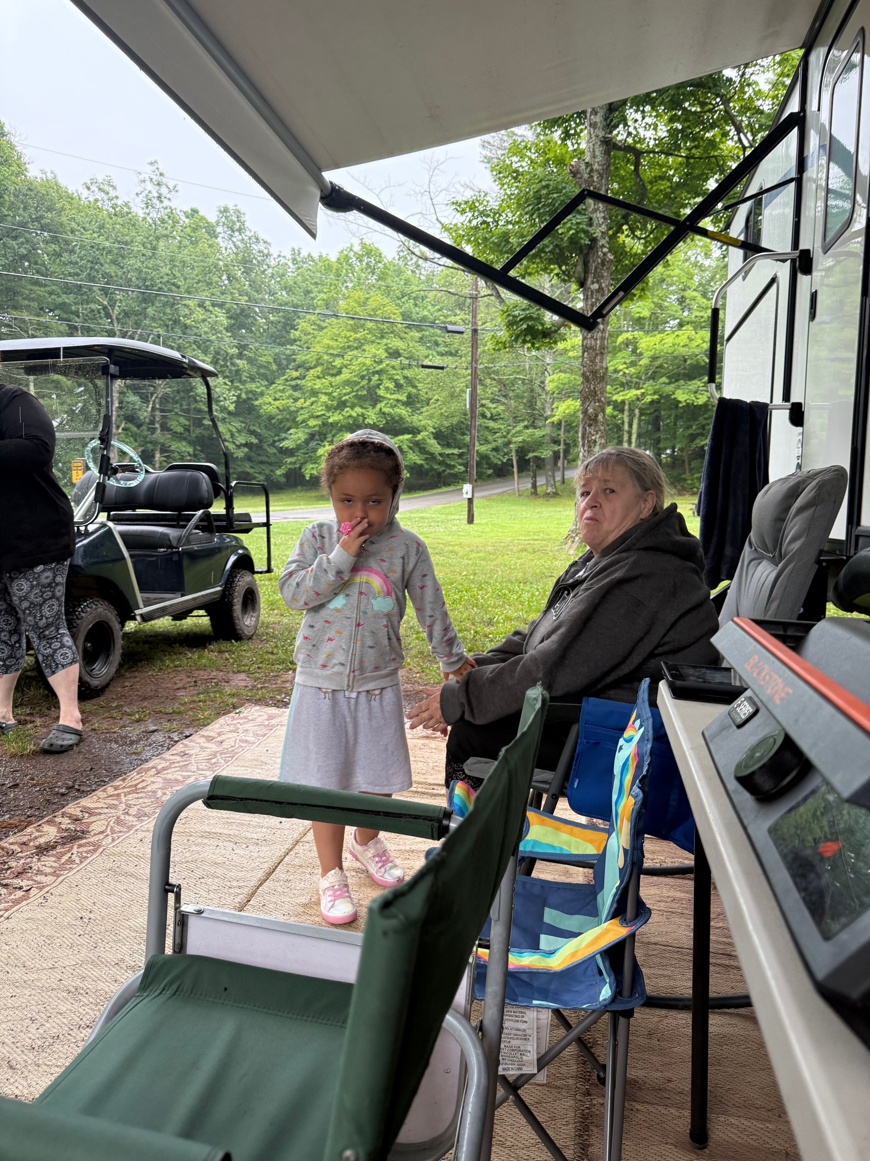 Grandma and granddaughter at the campsite
