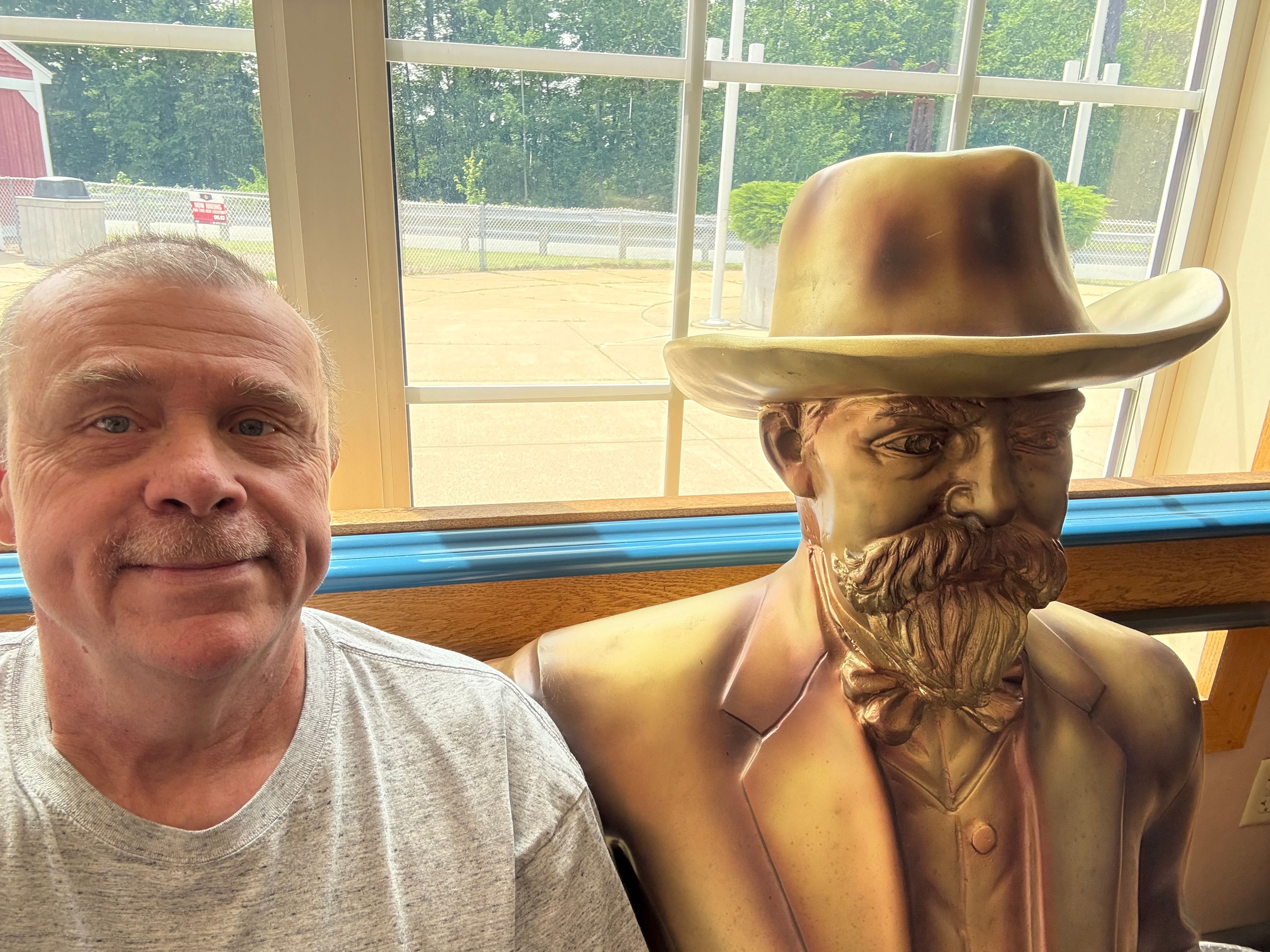 Grandpa with a sculpture selfie